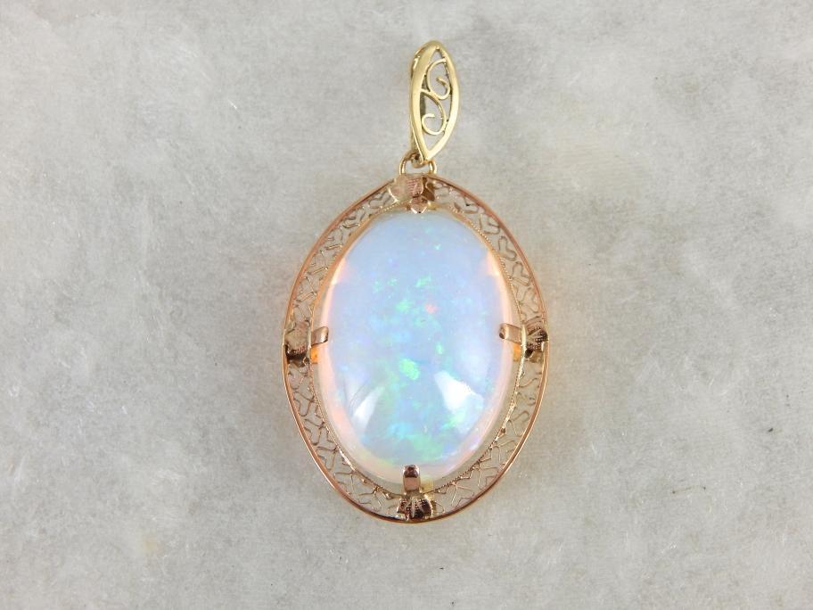 Important Collector's Gemstone Pendant, Ethiopian Opal in Filigree Gold