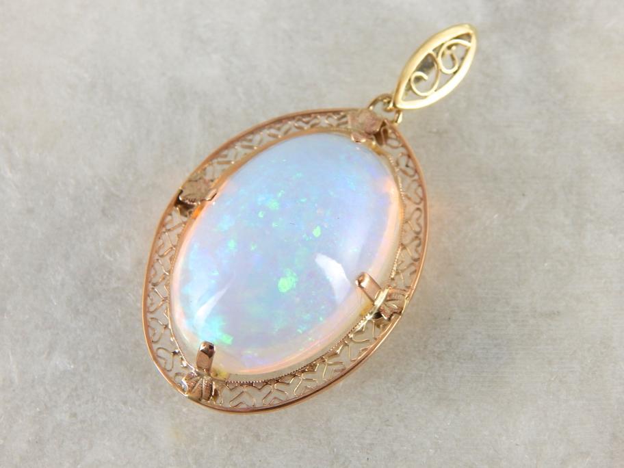 Important Collector's Gemstone Pendant, Ethiopian Opal in Filigree Gold