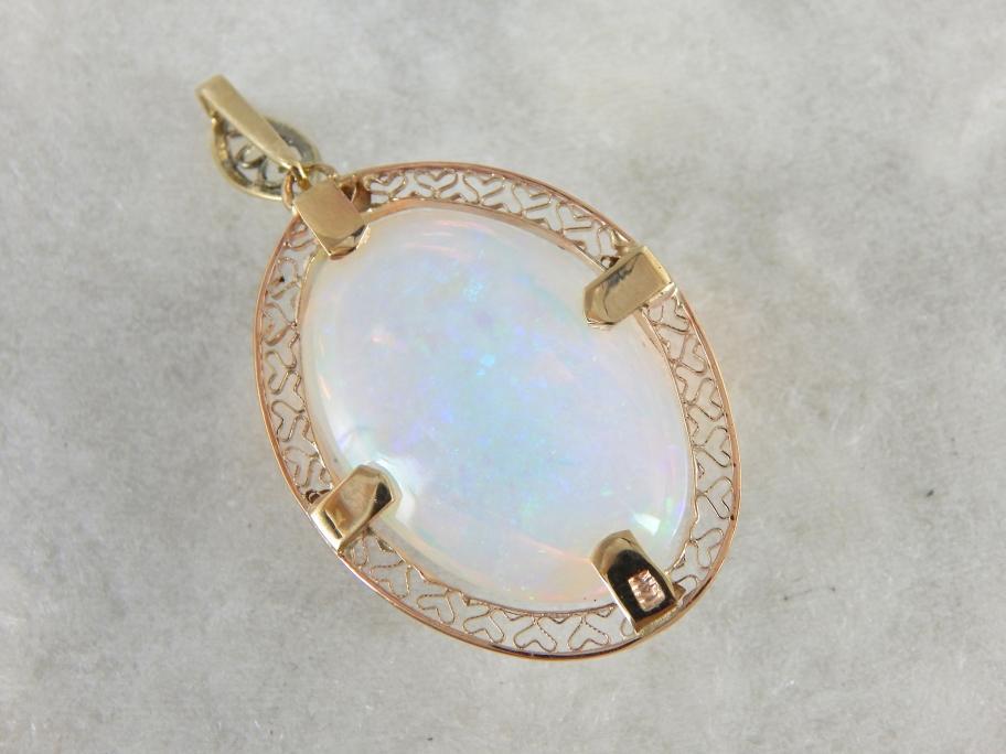 Important Collector's Gemstone Pendant, Ethiopian Opal in Filigree Gold