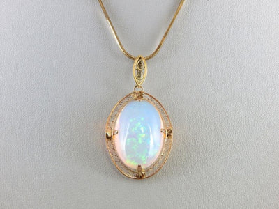 Important Collector's Gemstone Pendant, Ethiopian Opal in Filigree Gold