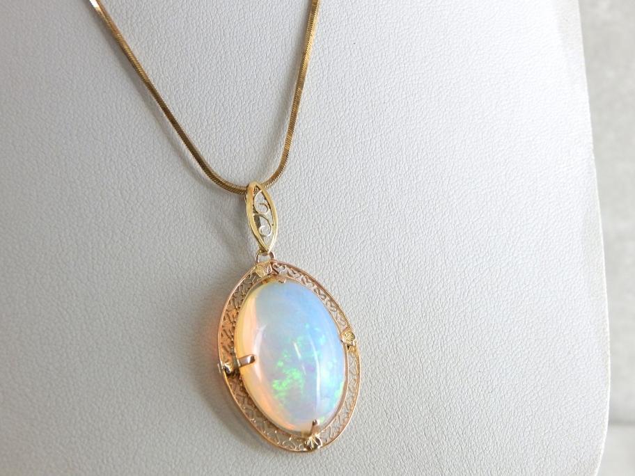 Important Collector's Gemstone Pendant, Ethiopian Opal in Filigree Gold