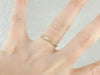 Channel Set Rosy Yellow Gold Diamond Band